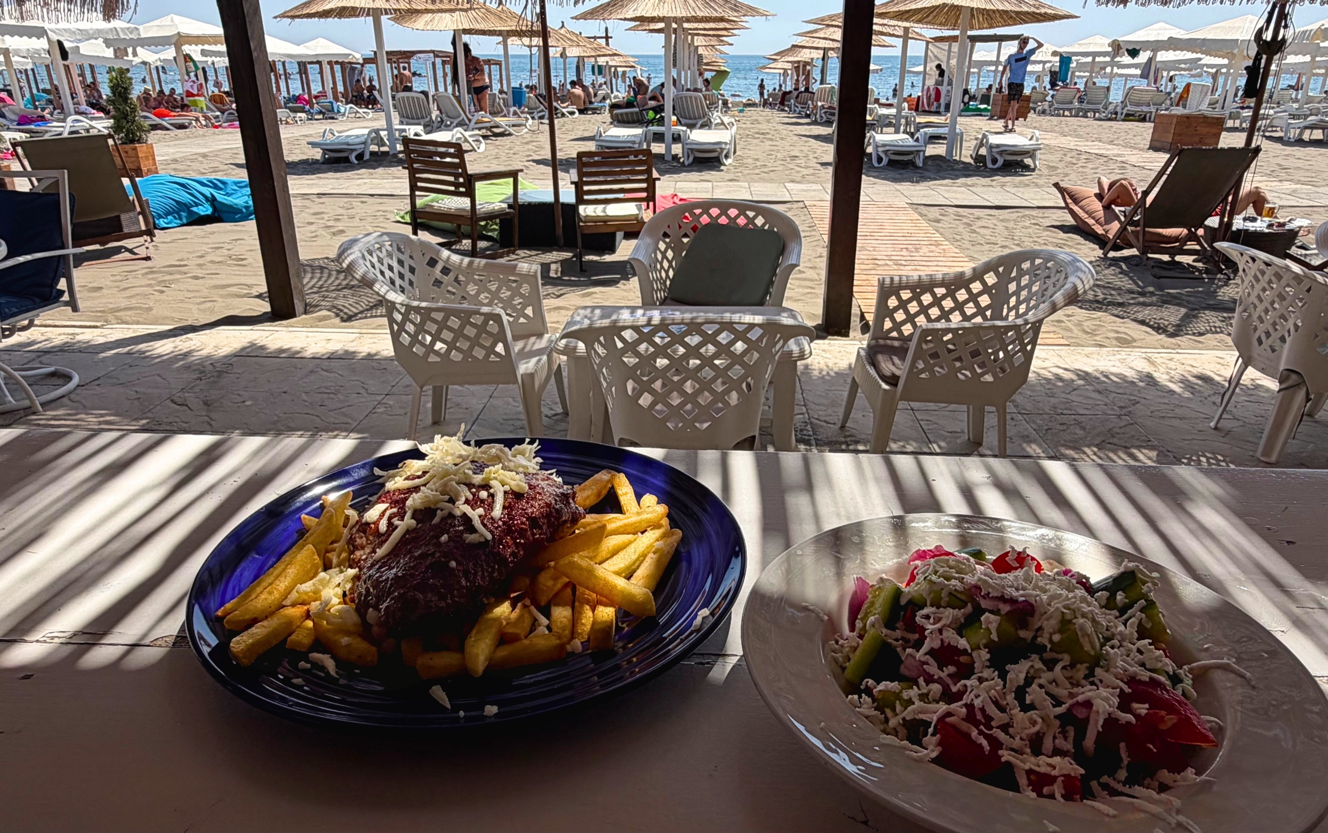 Punjena pljeskavica and shopska salad served at Miami Beach.