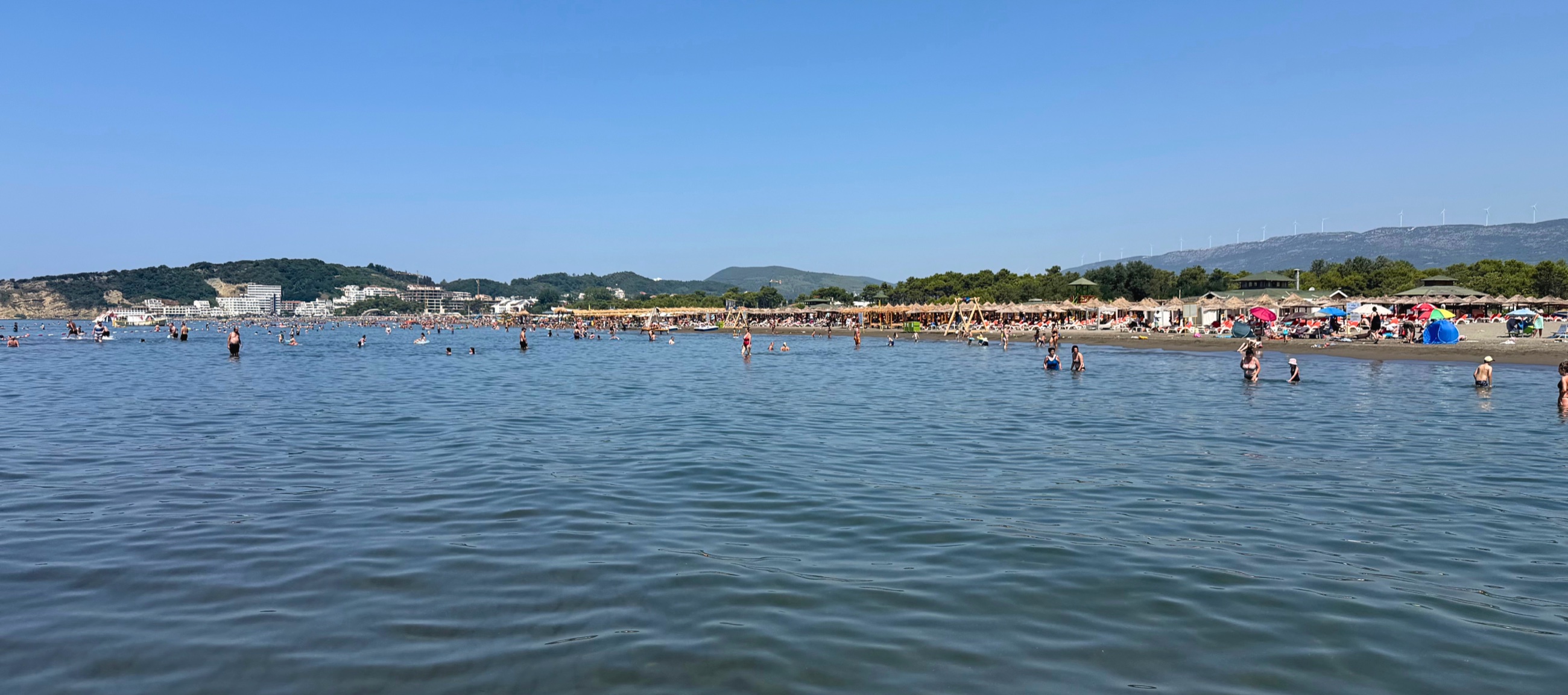 Velika Plaža and its long line of summer beach clubs.