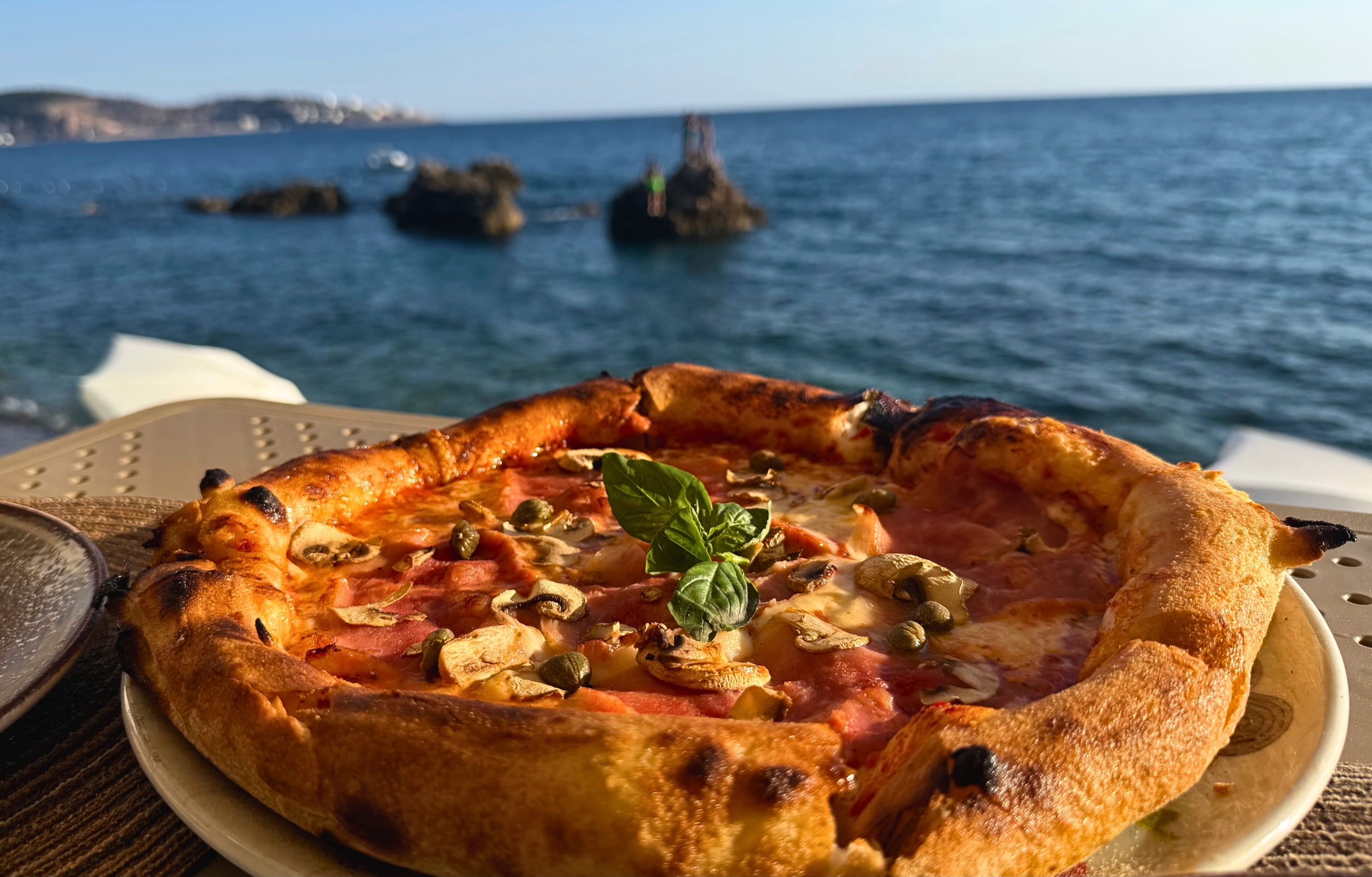 Neapolitan-style pizza served beside the Adriatic at Pino Del Mar