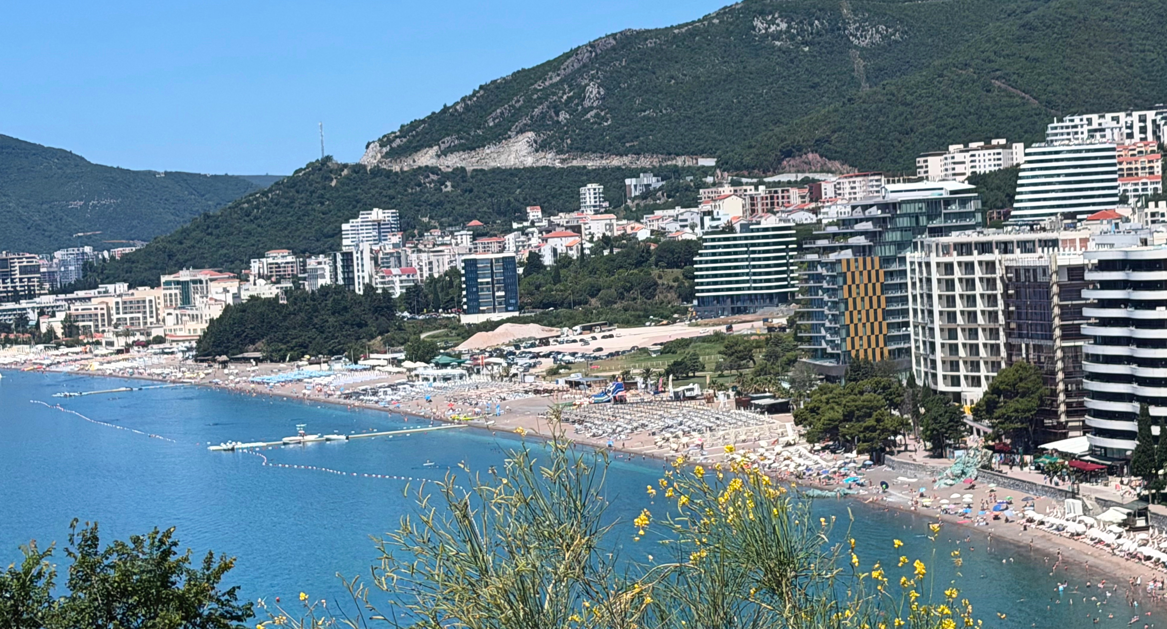 Budva's Adriatic shoreline, beaches and the Old Town against the sea.