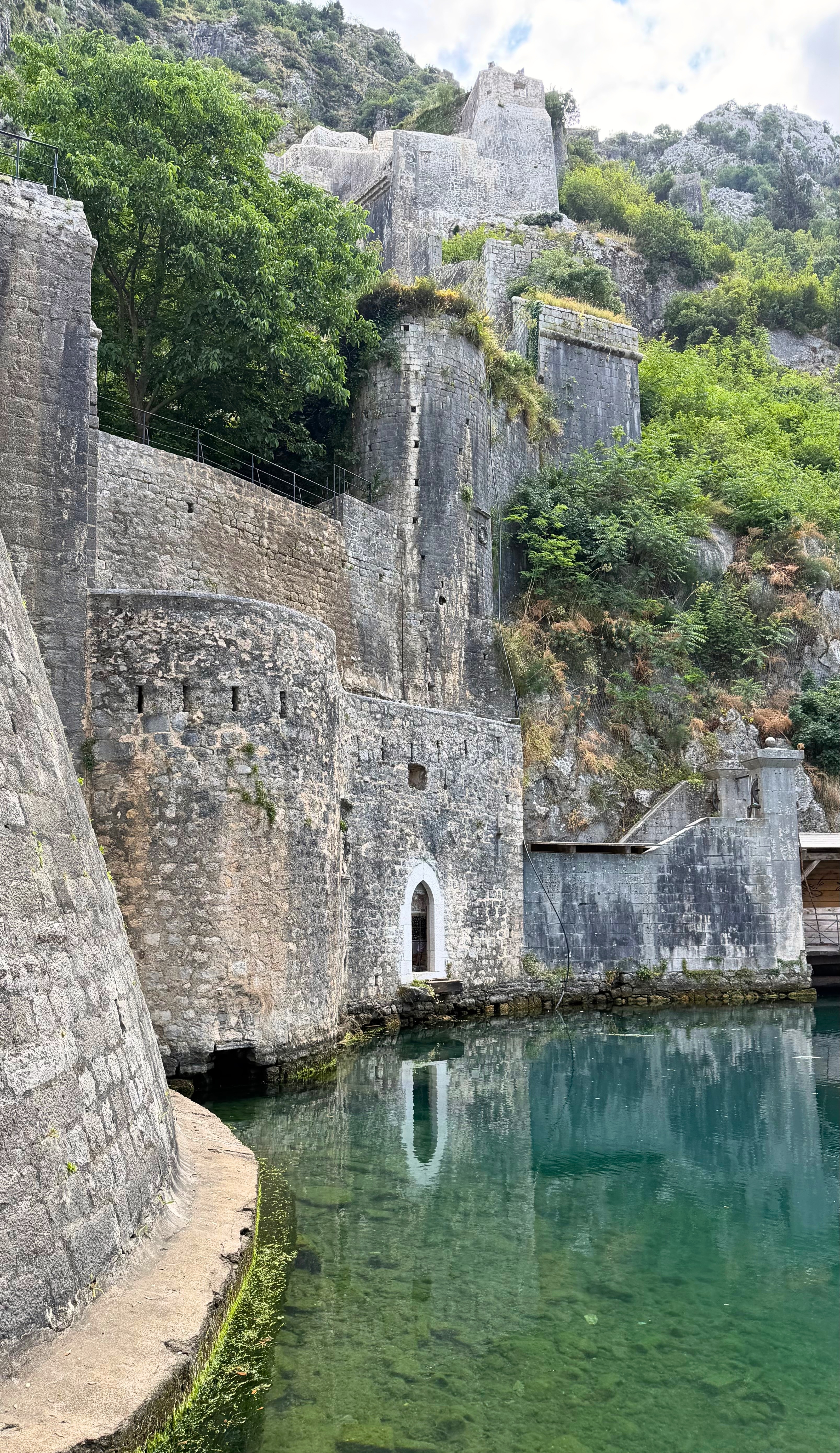 Kotor's fortifications rising from the bay and climbing into the mountain.