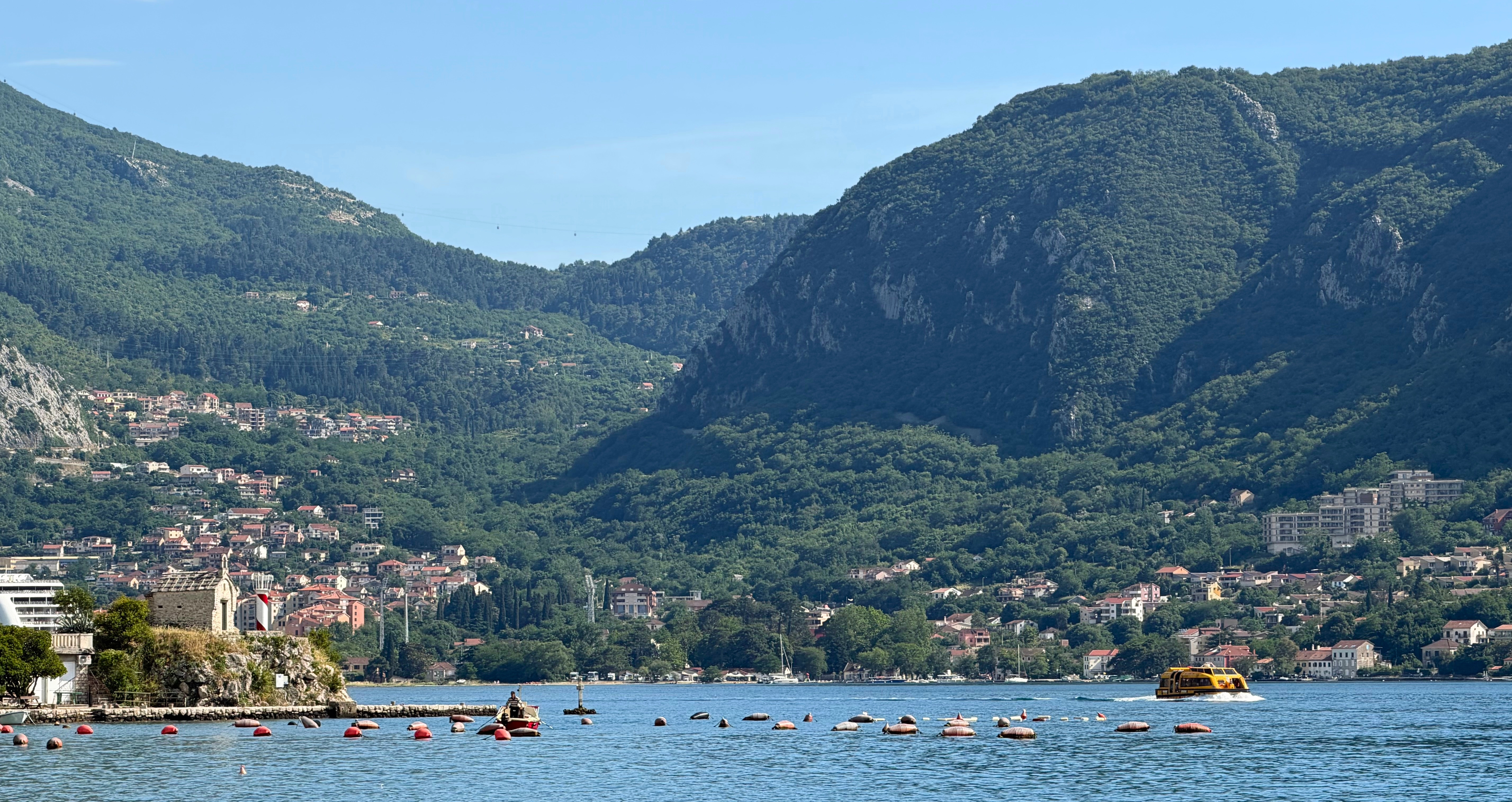 The Dobrota waterfront with Kotor nearby across the bay.