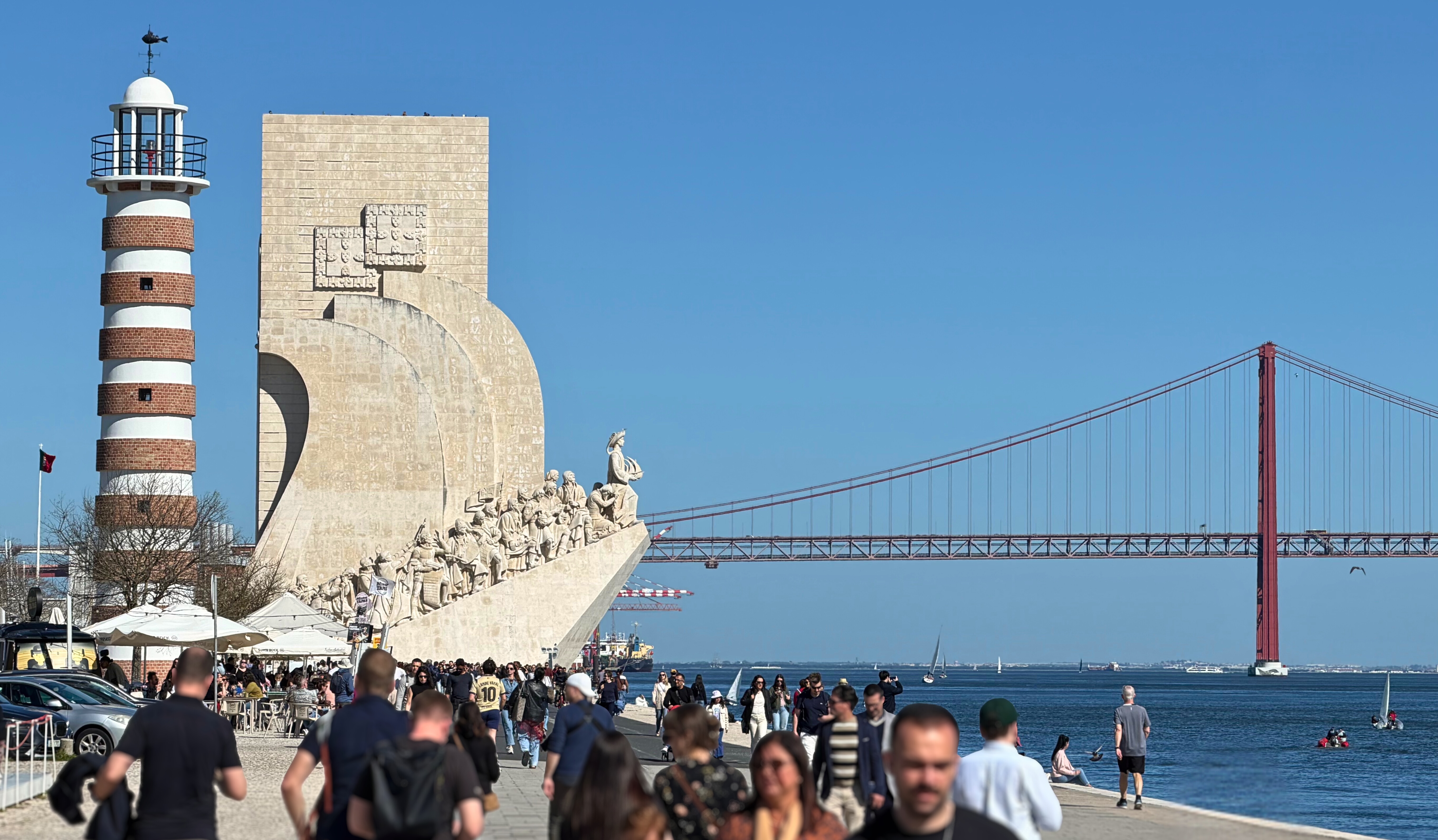 The Monument to the Discoveries, Tagus river, and bridge in Belém.