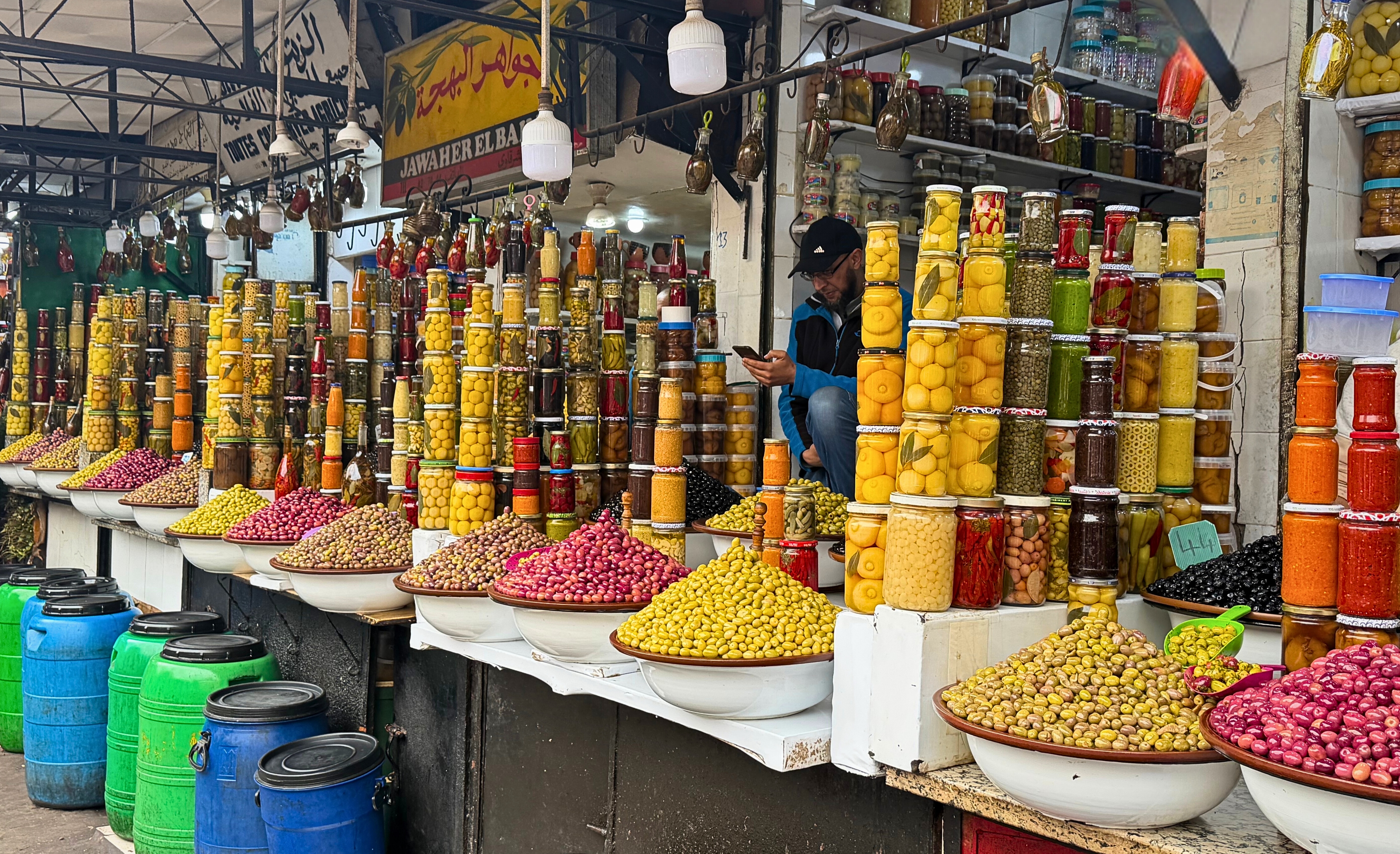 Olives and preserved lemons displayed at a market stall in Marrakesh.