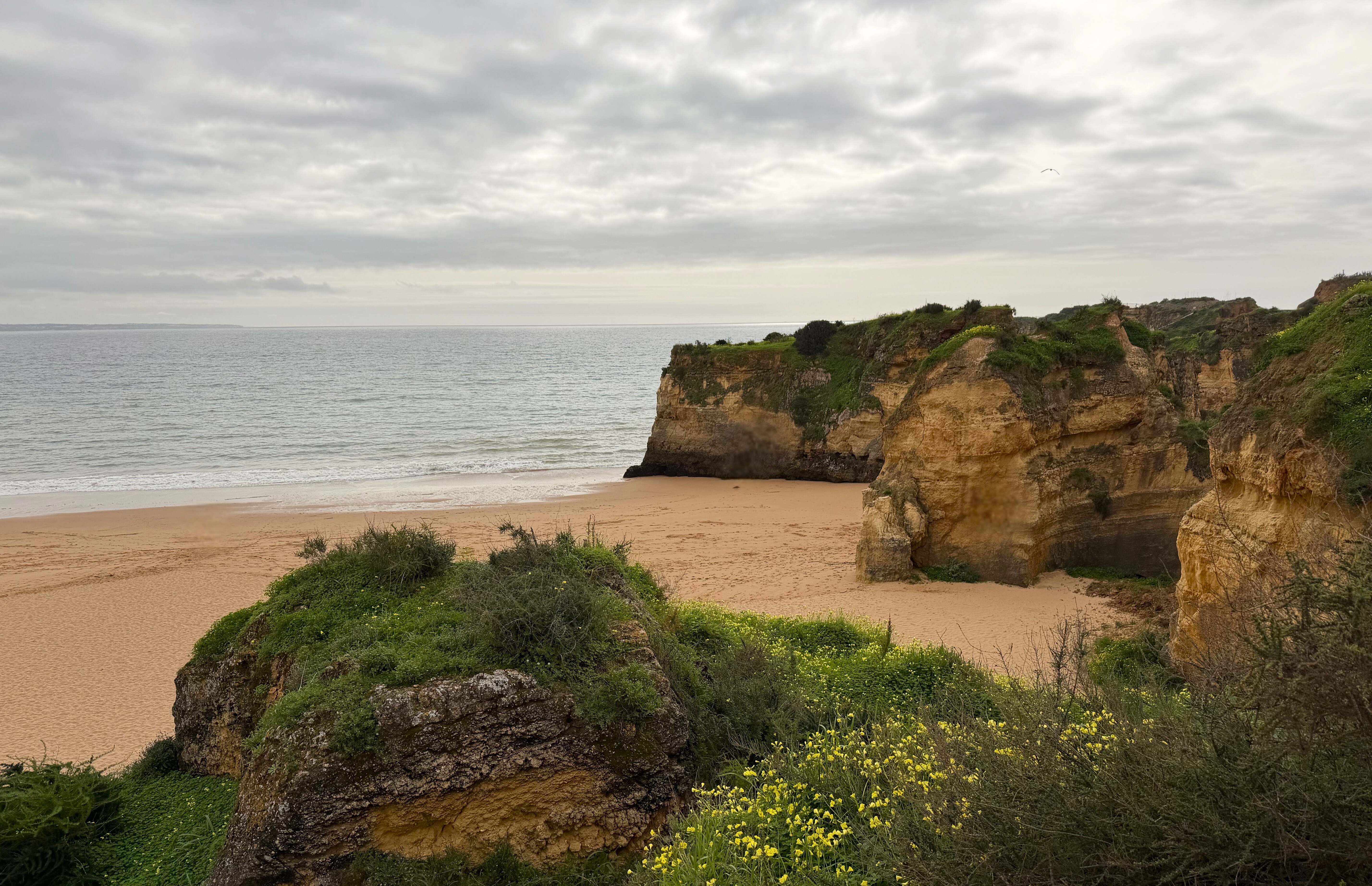 The Algarve coast near Lagos, Portugal, with cliffs and sea.
