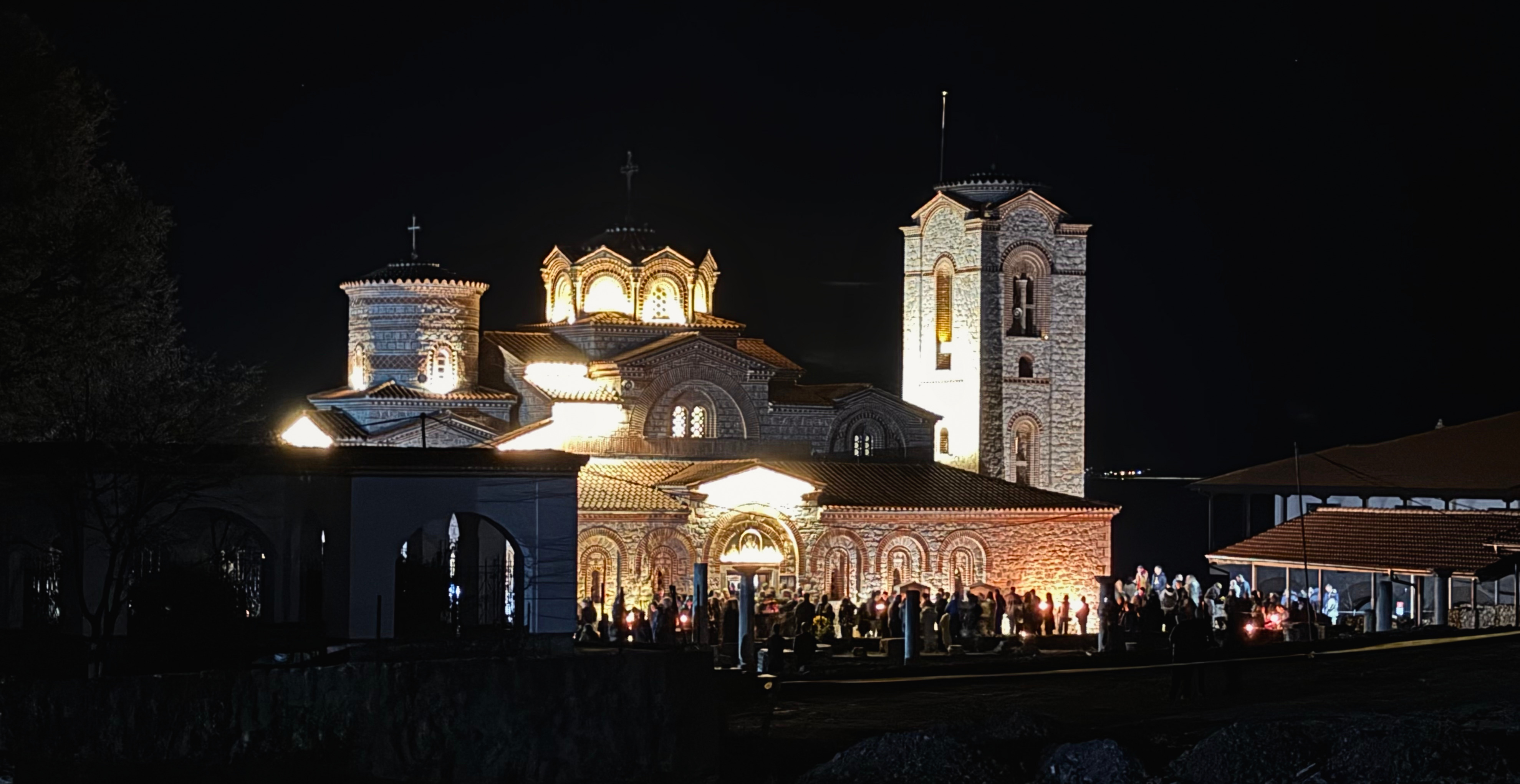 The church of Saints Clement and Panteleimon at Plaošnik lit at night during the Orthodox Easter service.