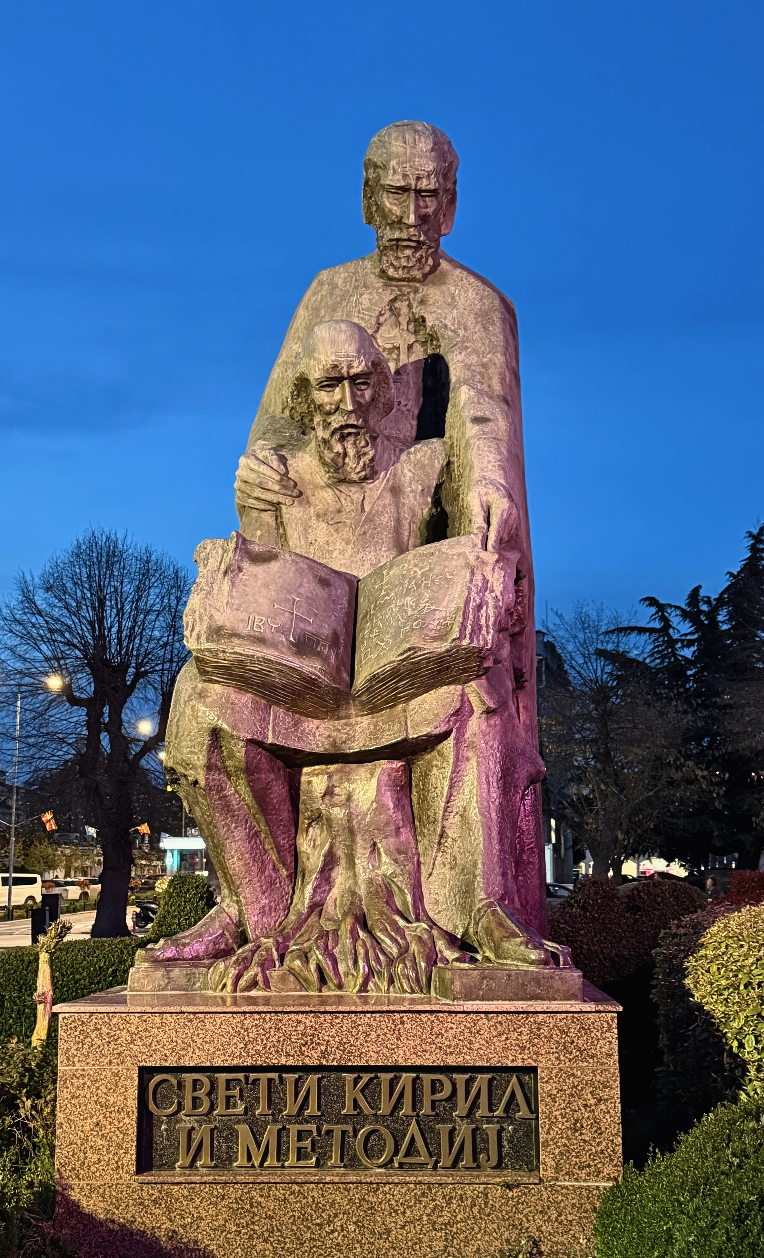 Statue of Saints Cyril and Methodius in Ohrid at dusk.