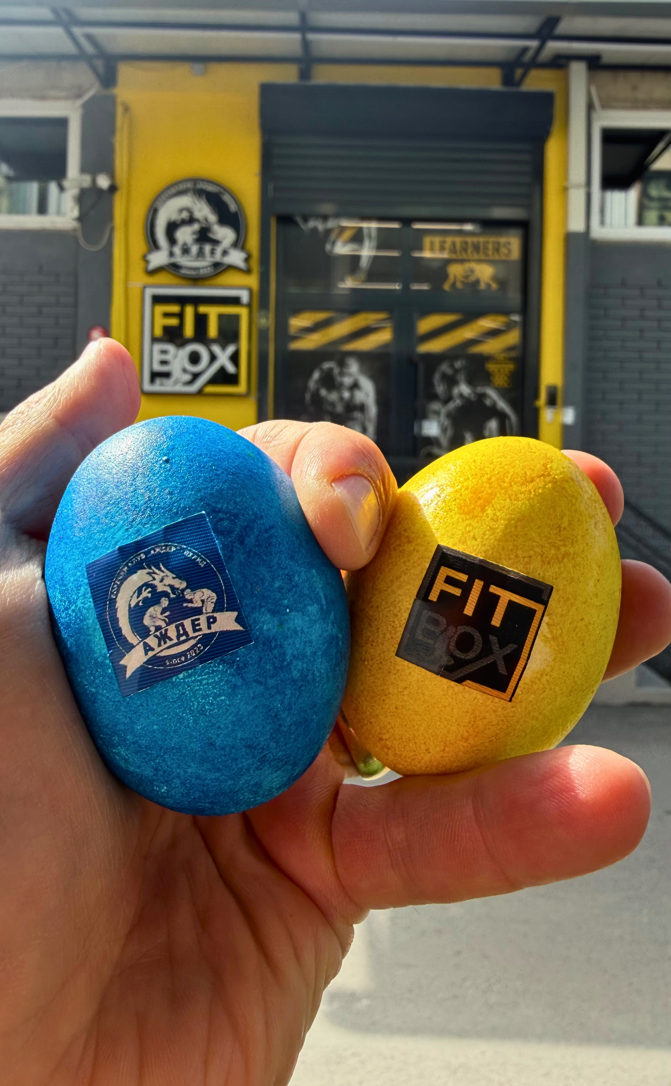 Blue and yellow Easter eggs held outside Fit Box gym in Ohrid.