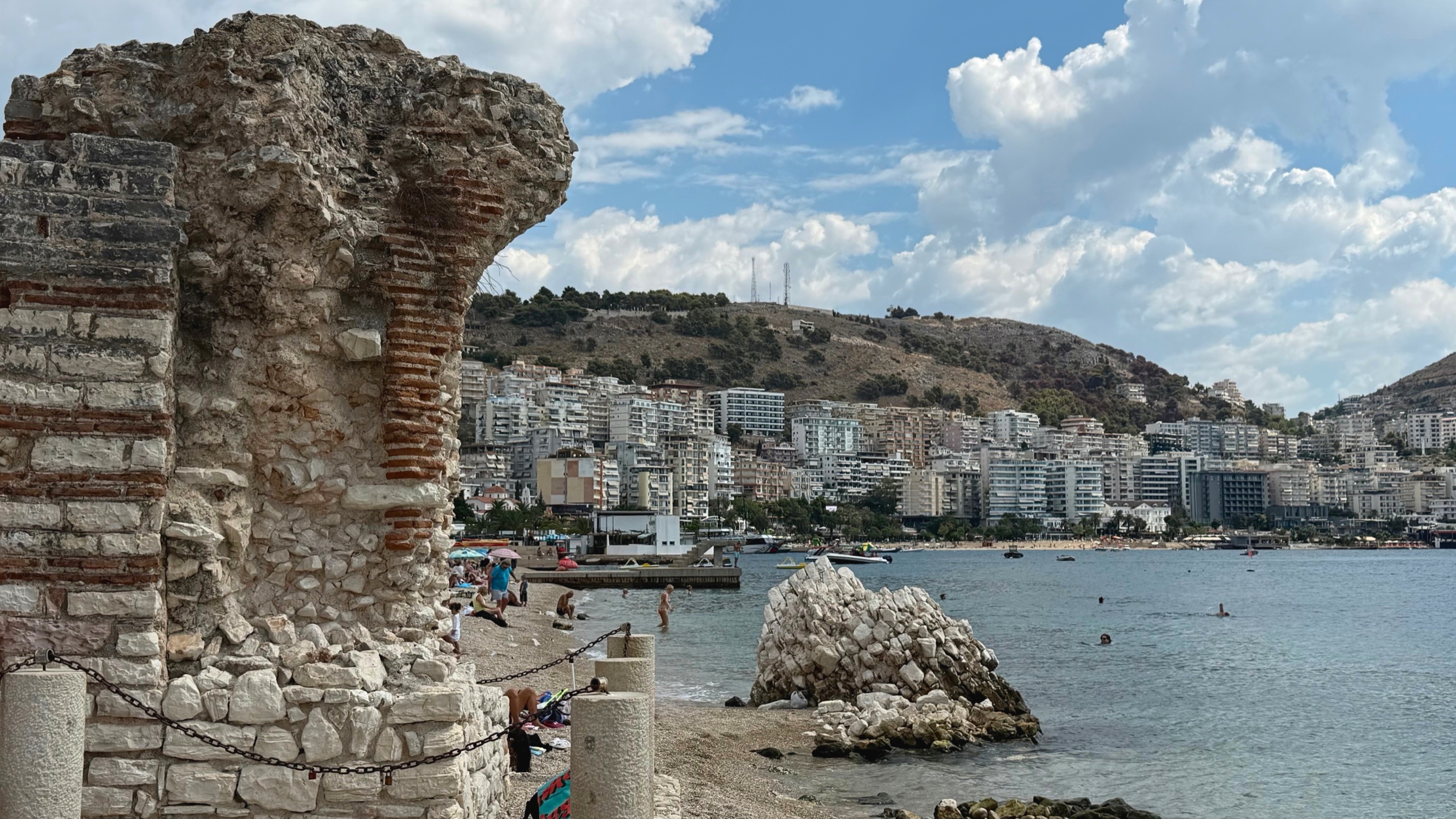 Ancient brick and stonework beside the water at Sarandë Public Beach.