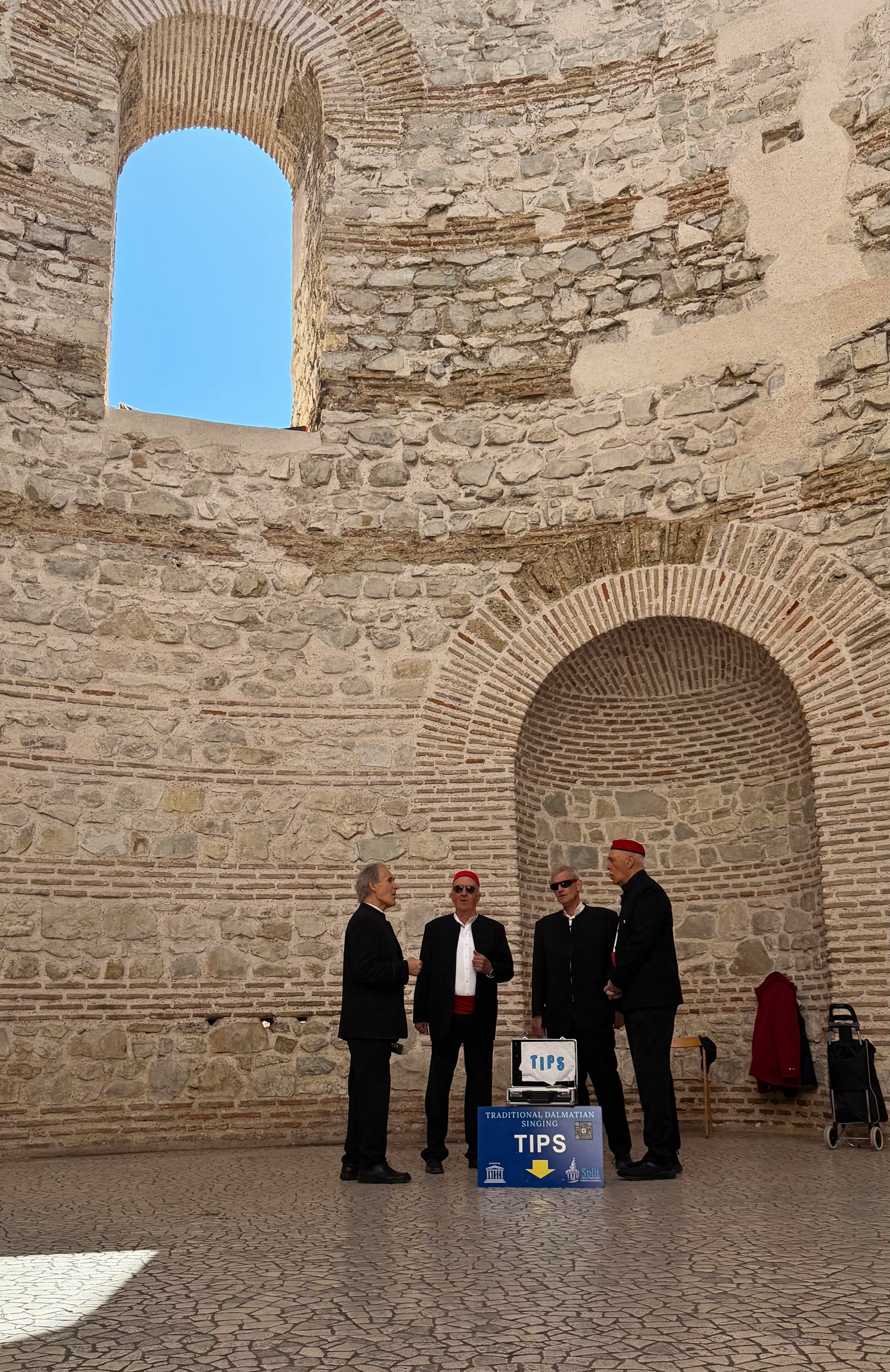 Traditional klapa singers standing beneath the arches of the Vestibule in Diocletian’s Palace