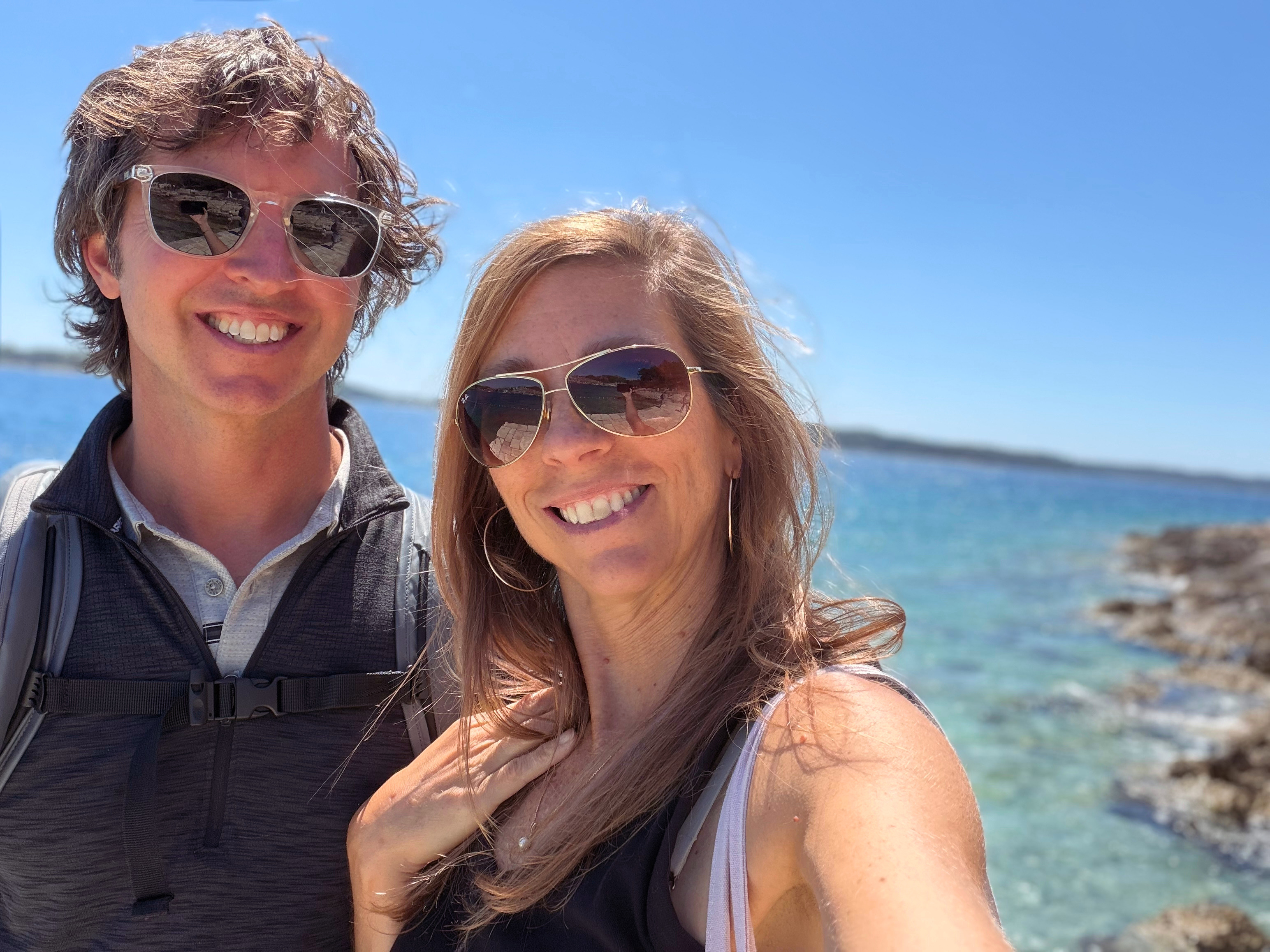Sam and Stephanie beside the clear water in Hvar