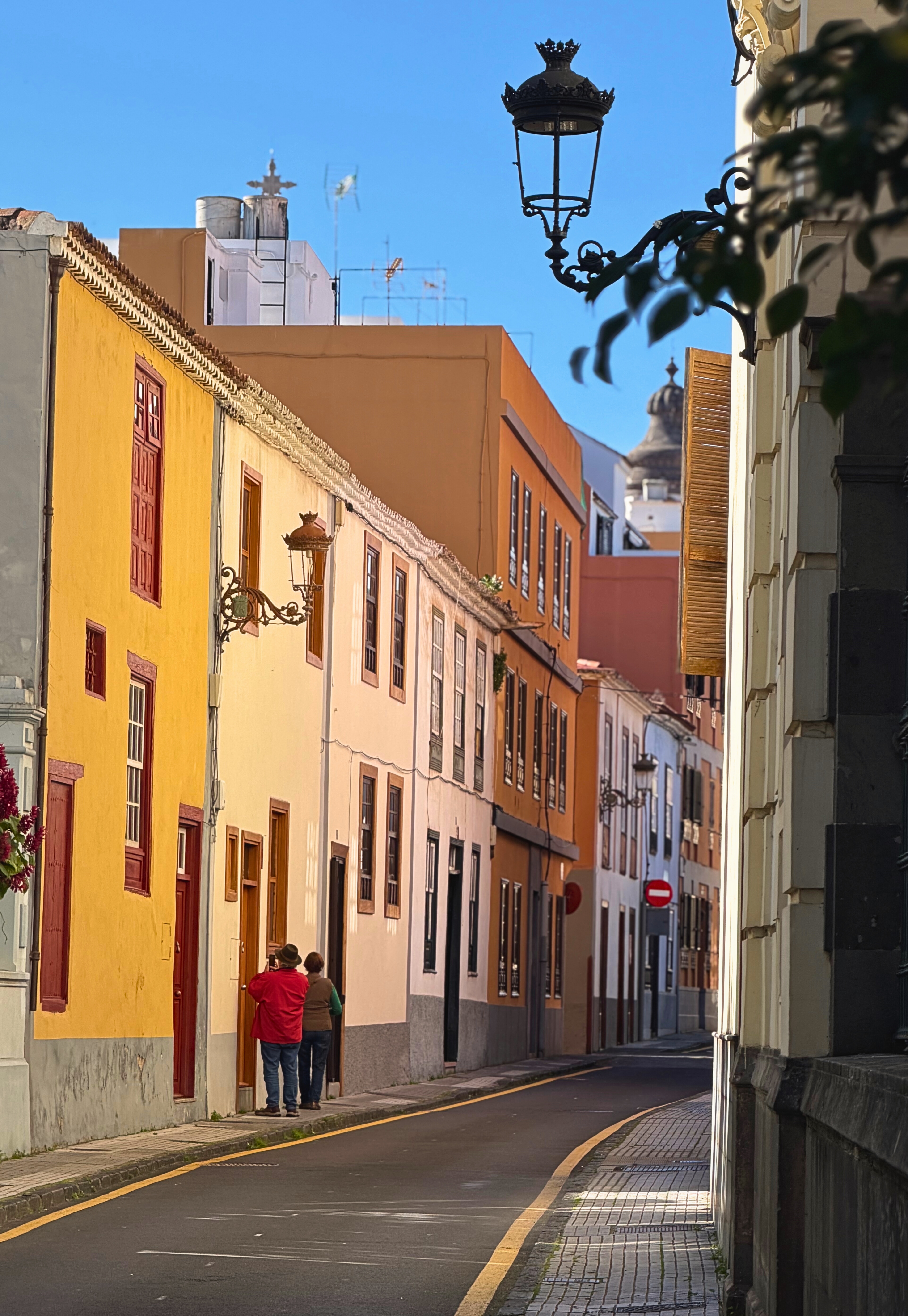A street in La Laguna, Tenerife, in afternoon light.