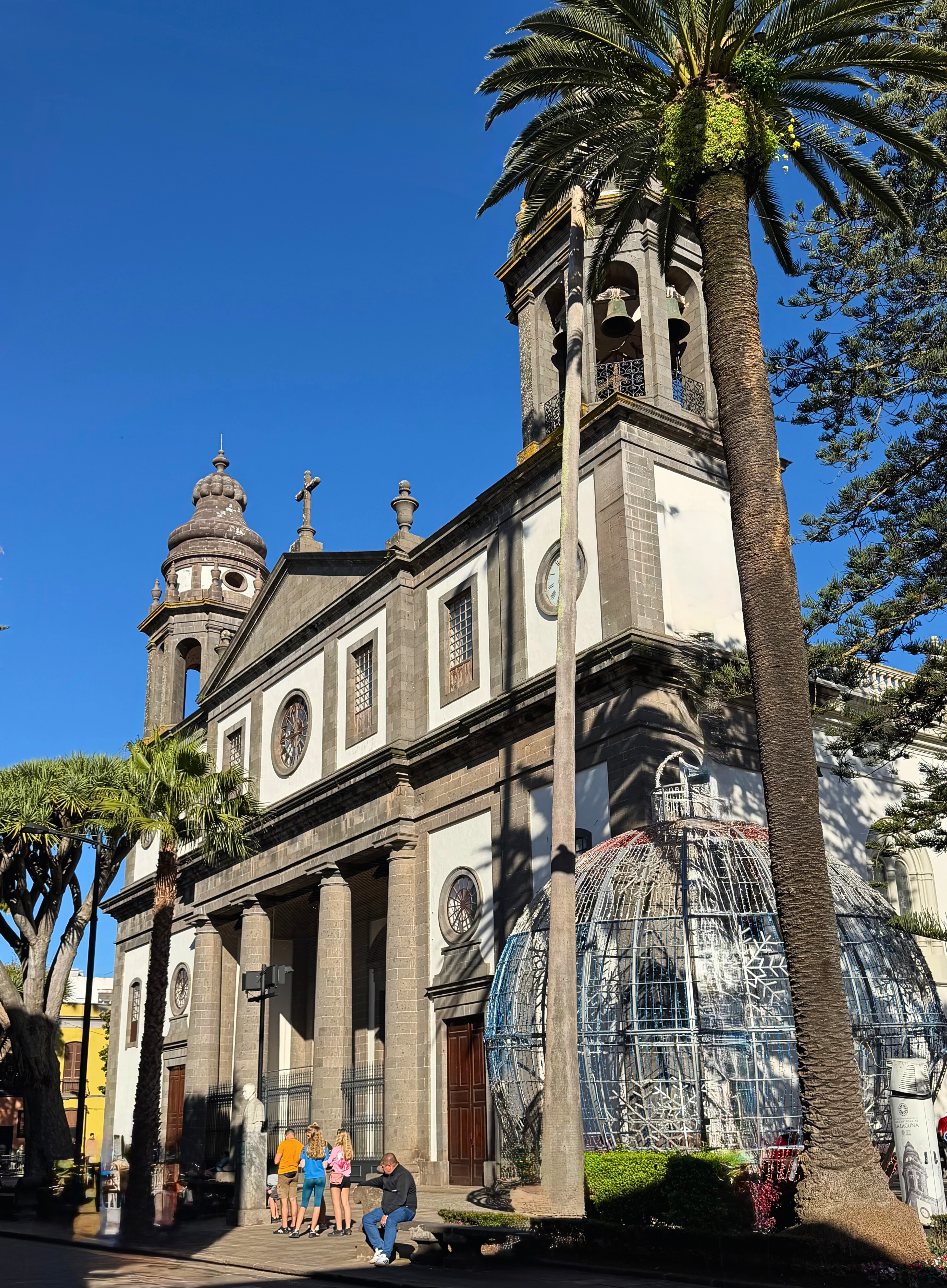 A church in La Laguna under a bright blue sky.