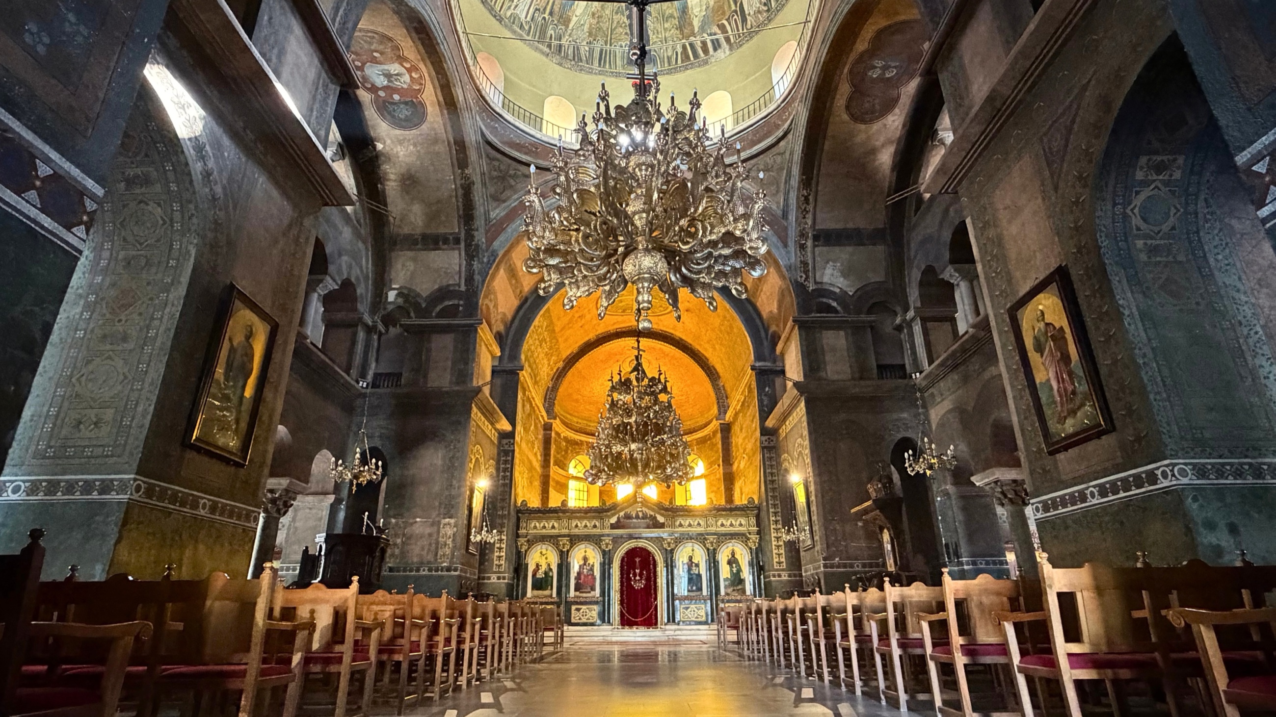 Mosaics, icons, and chandeliers inside Hagia Sophia in Thessaloniki