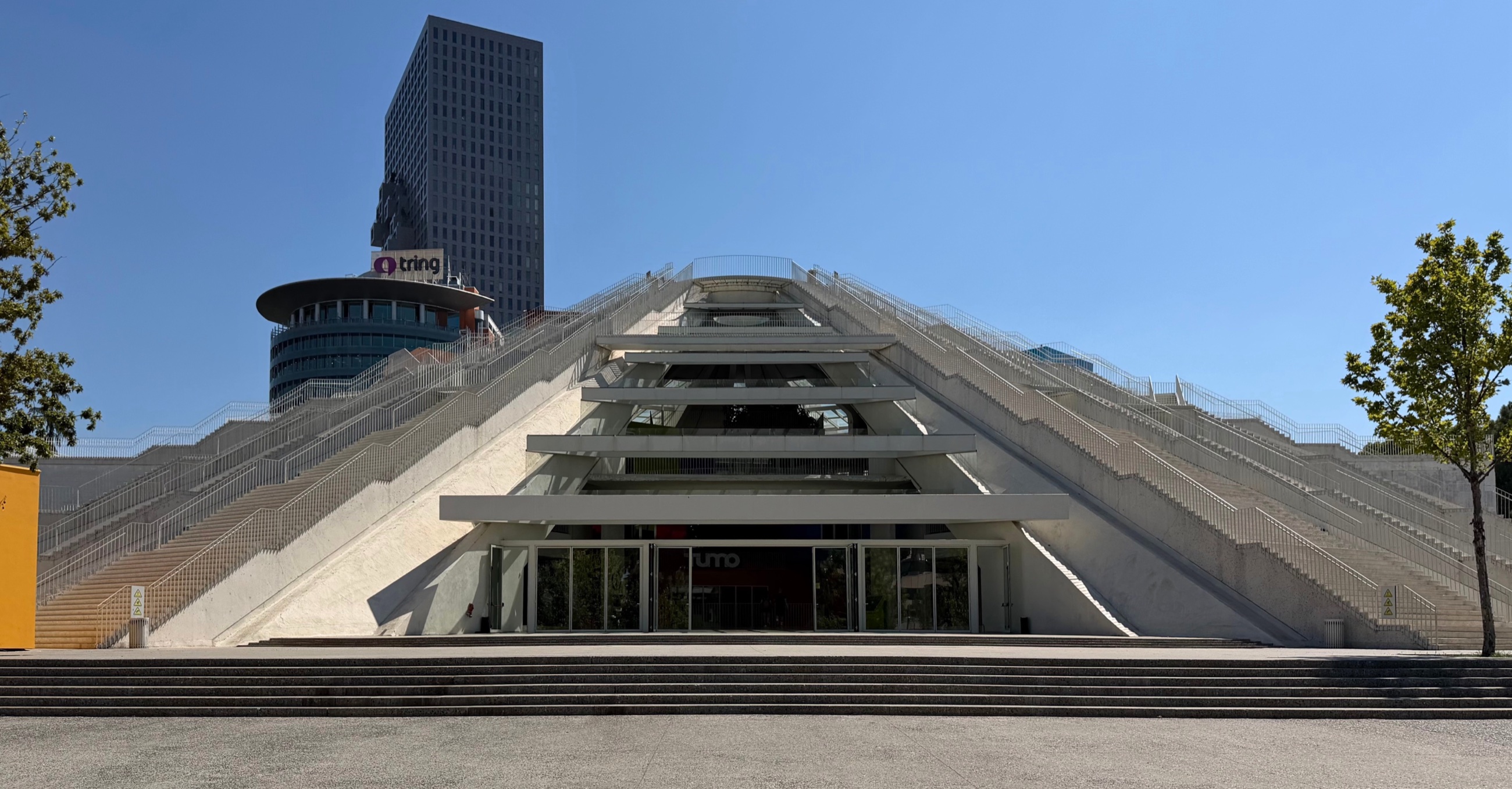 The Pyramid of Tirana viewed from below, with its rebuilt terraces and upper platform.