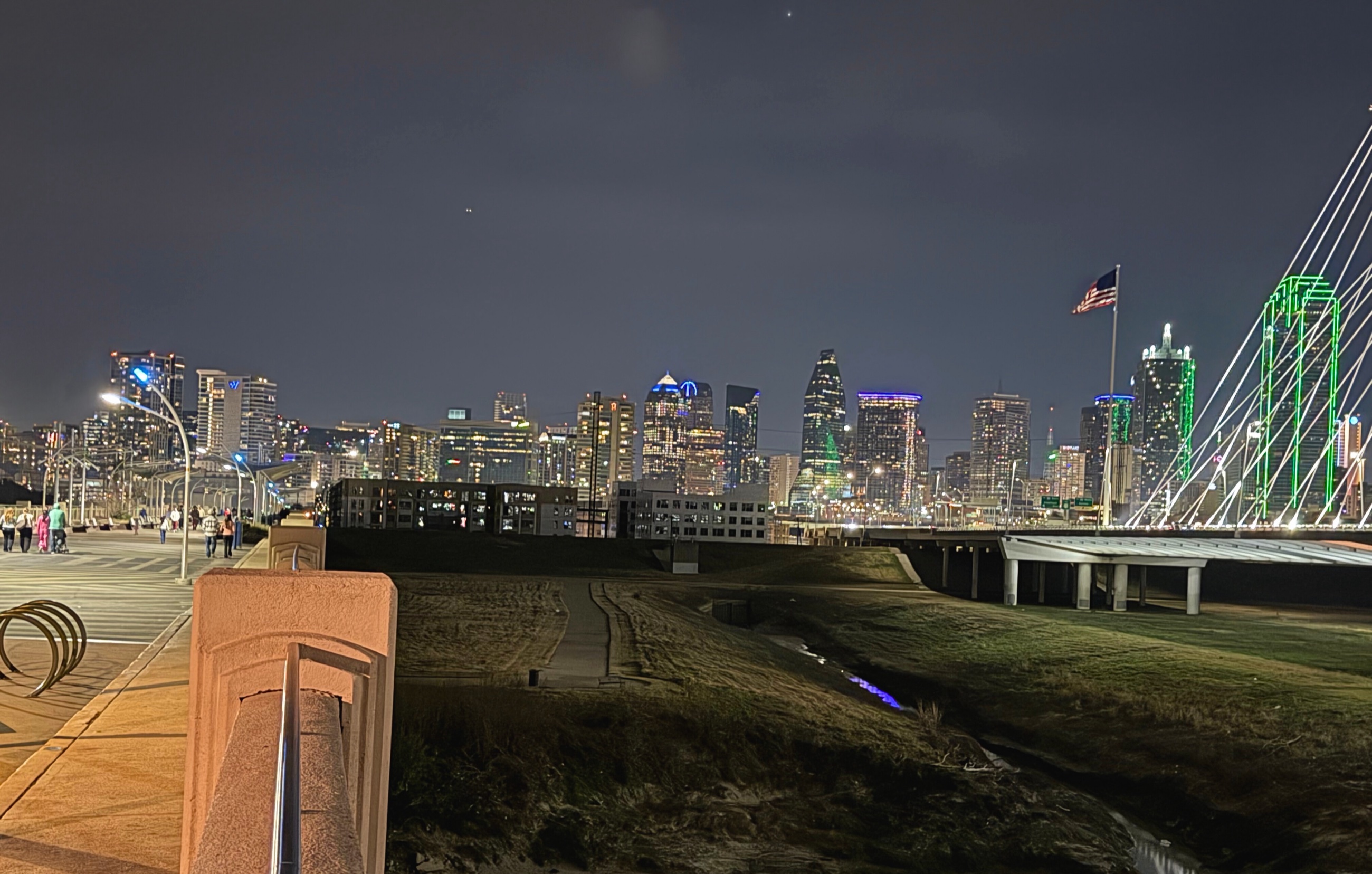 Downtown Dallas buildings illuminated at night.