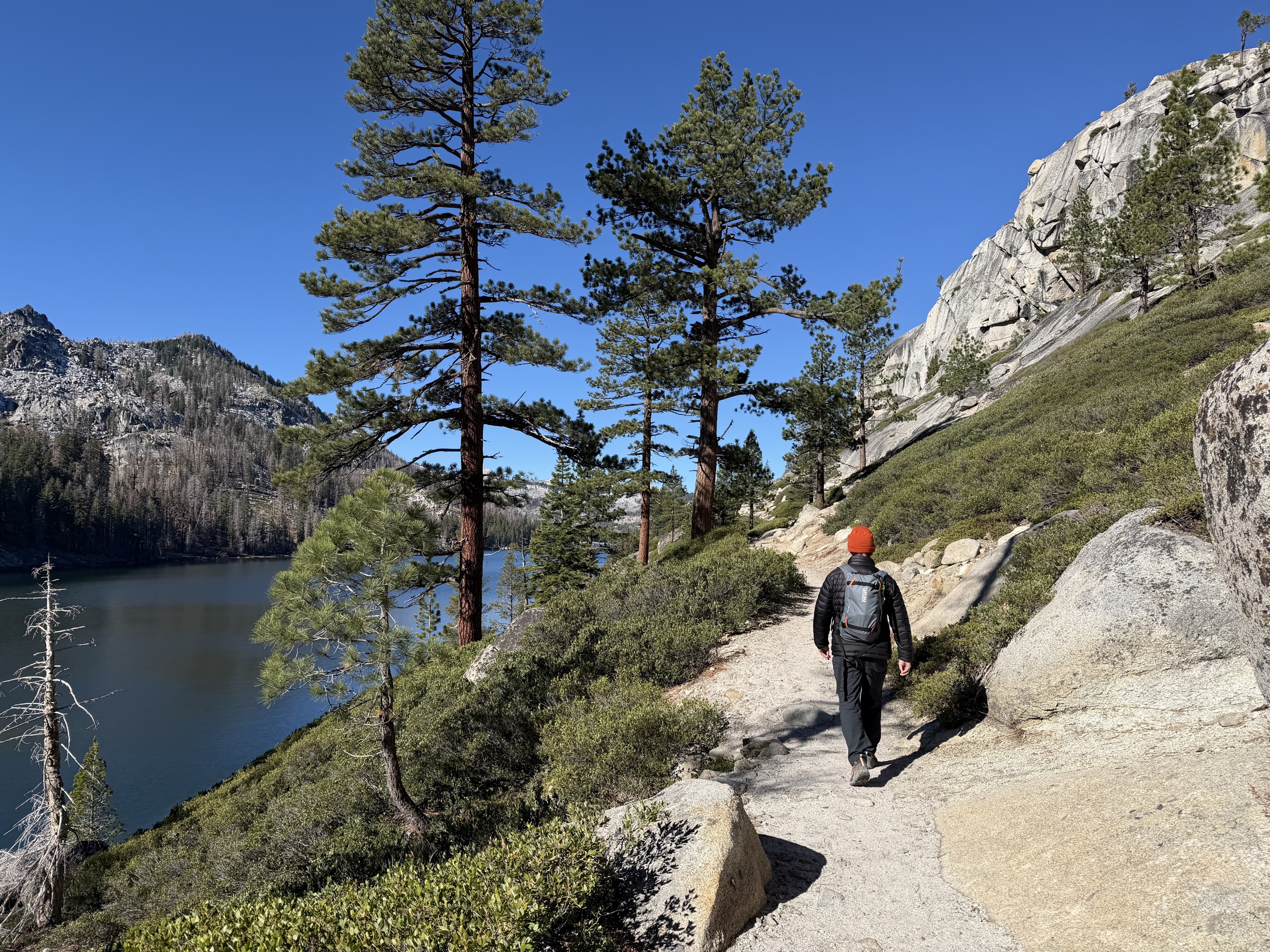 Sam walking along the rock trail above Echo Lakes.