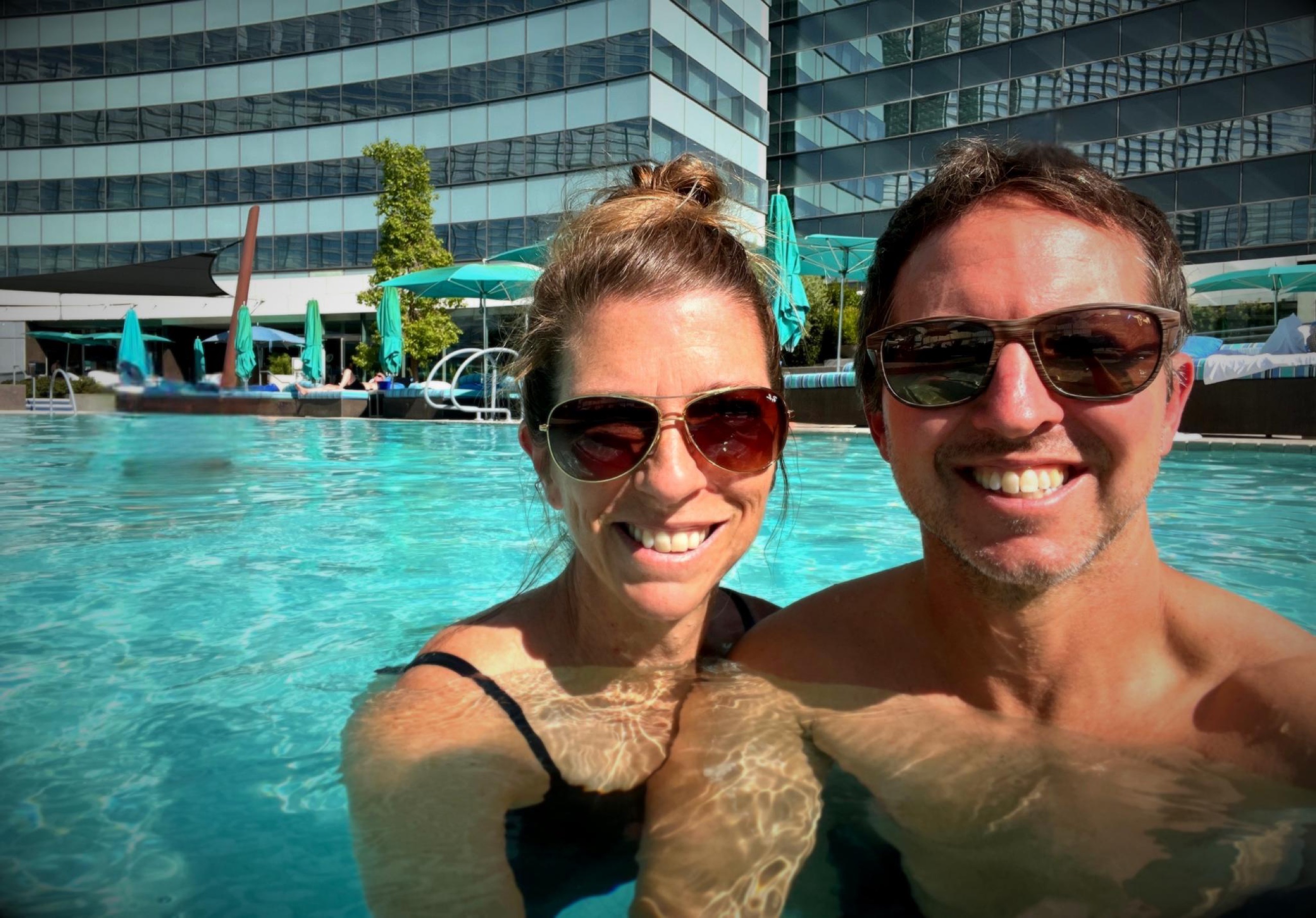 A quiet afternoon by the Vdara pool surrounded by glass towers.