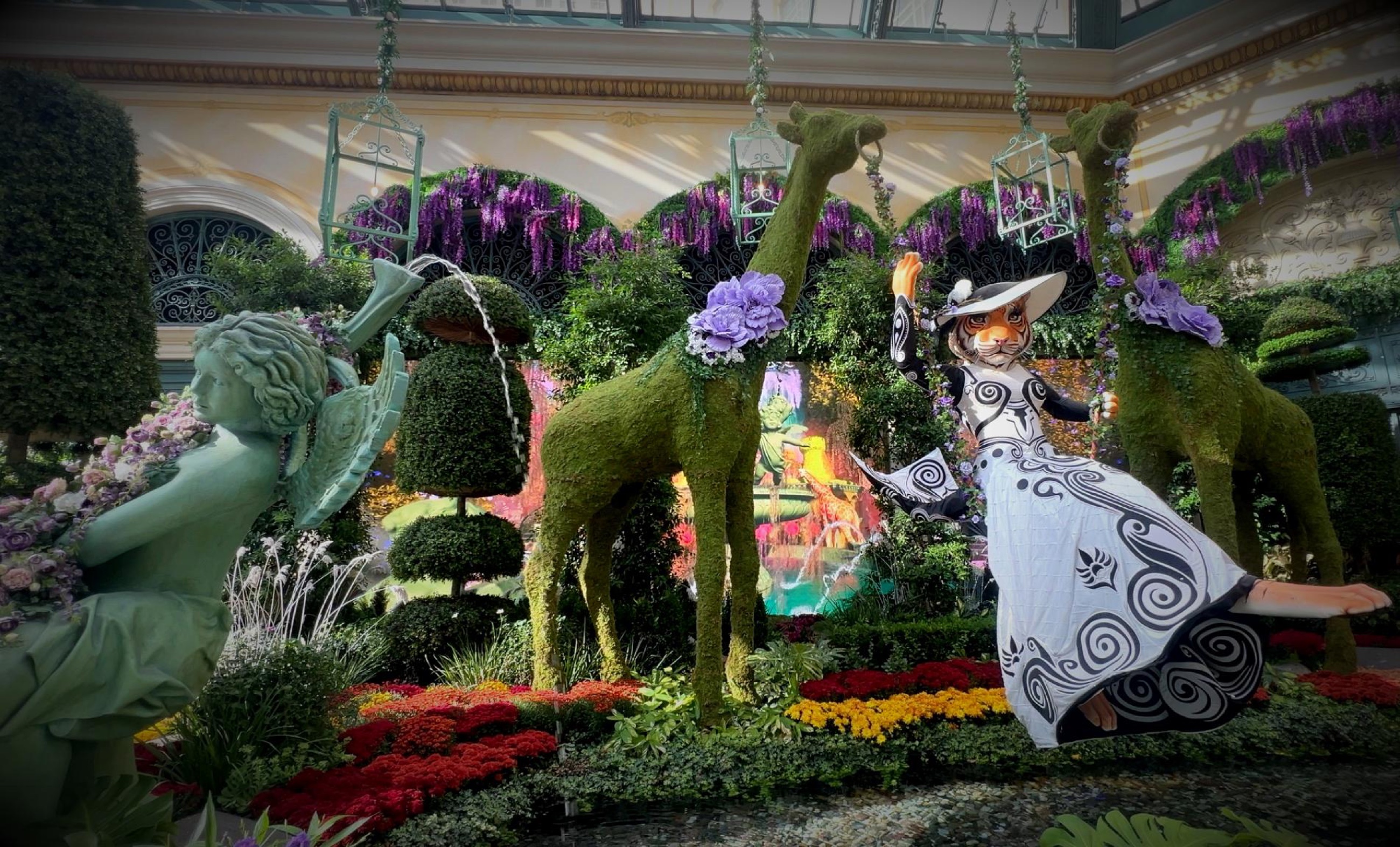 Flowers and sculpture inside the Bellagio Conservatory.