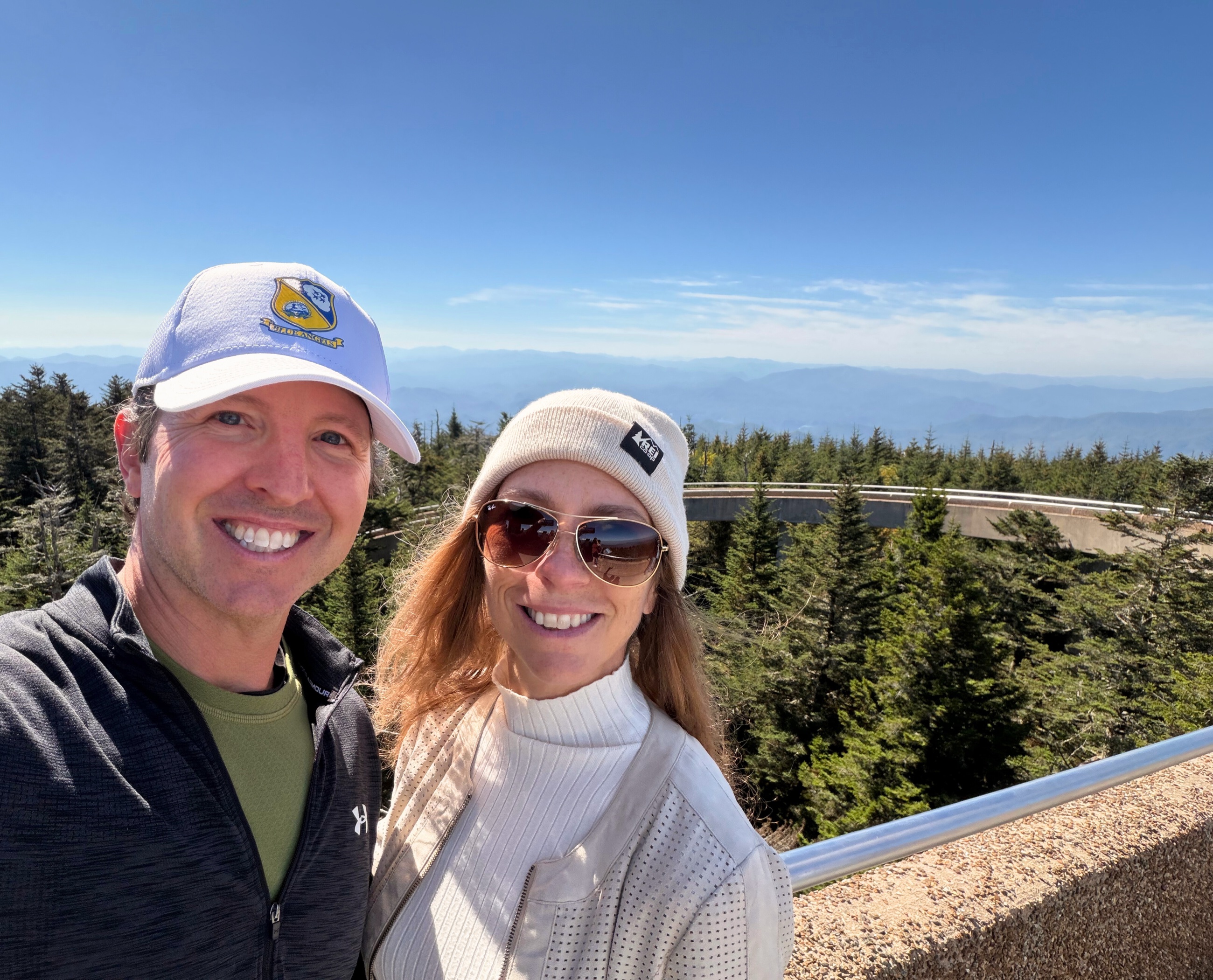 Sam and Stephanie standing at Clingmans Dome in Great Smoky Mountains National Park.