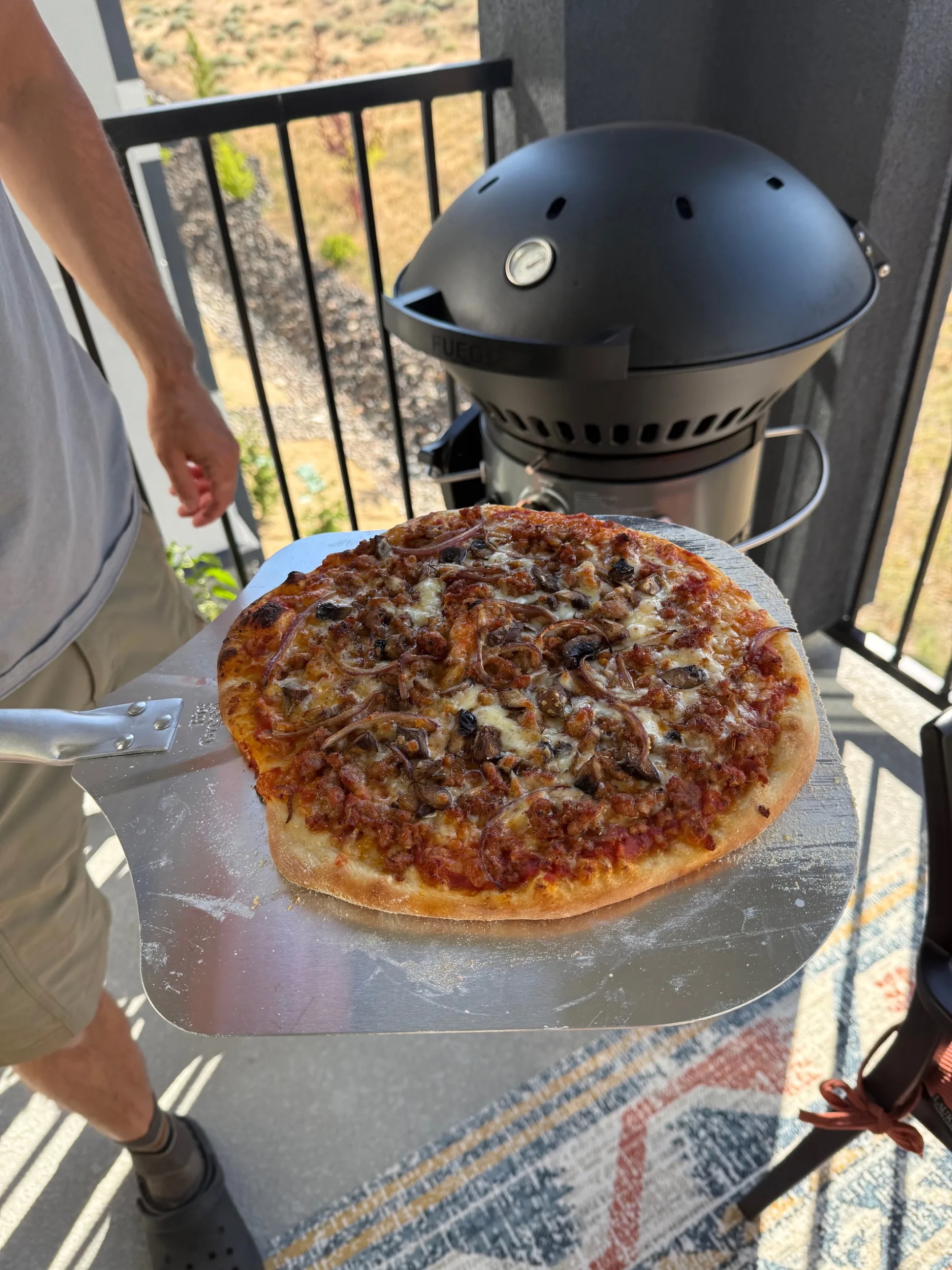 Grilled pizza with seasonal vegetables on a Reno patio