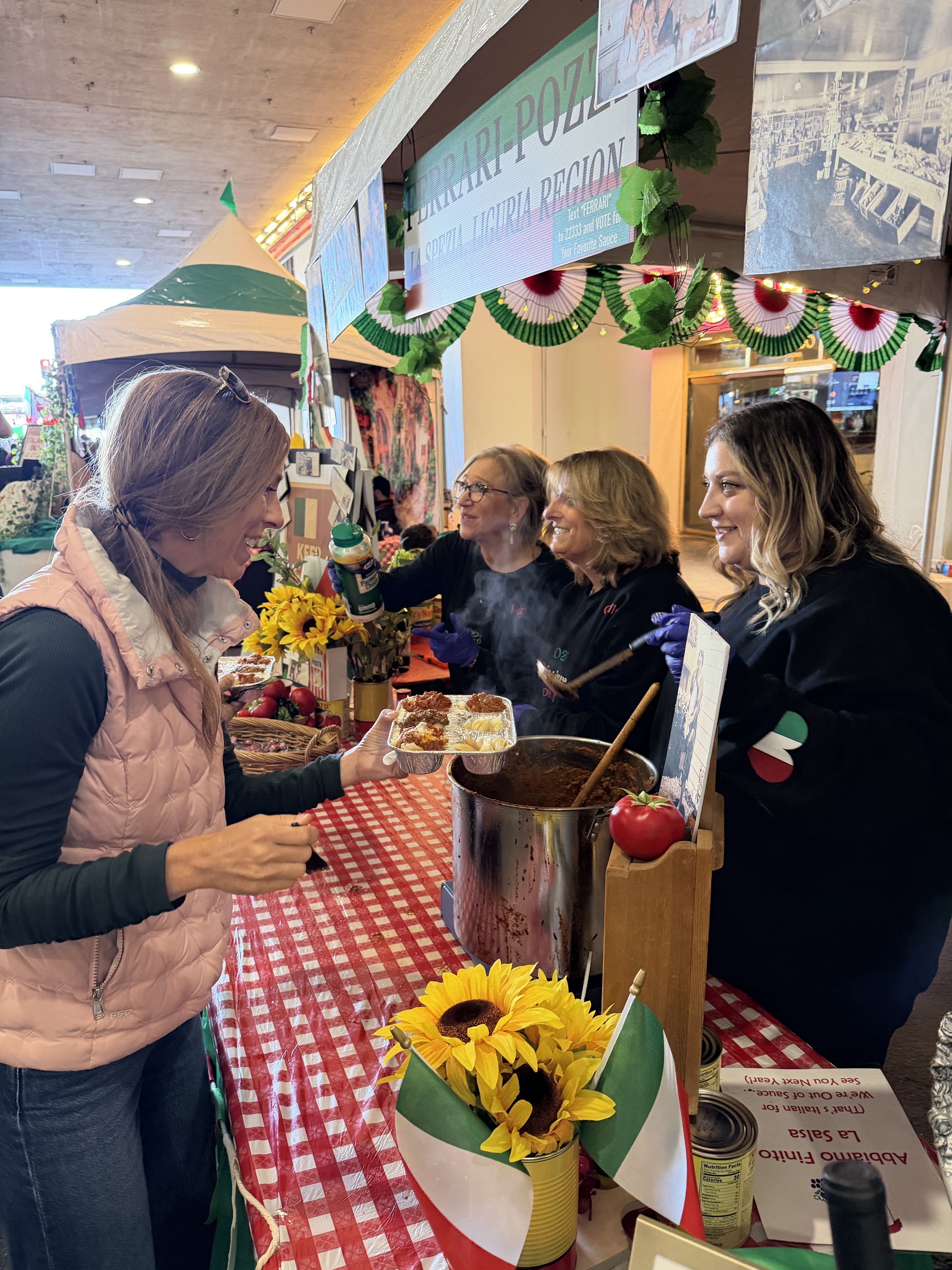 Stephanie sampling entries at the family sauce cook-off