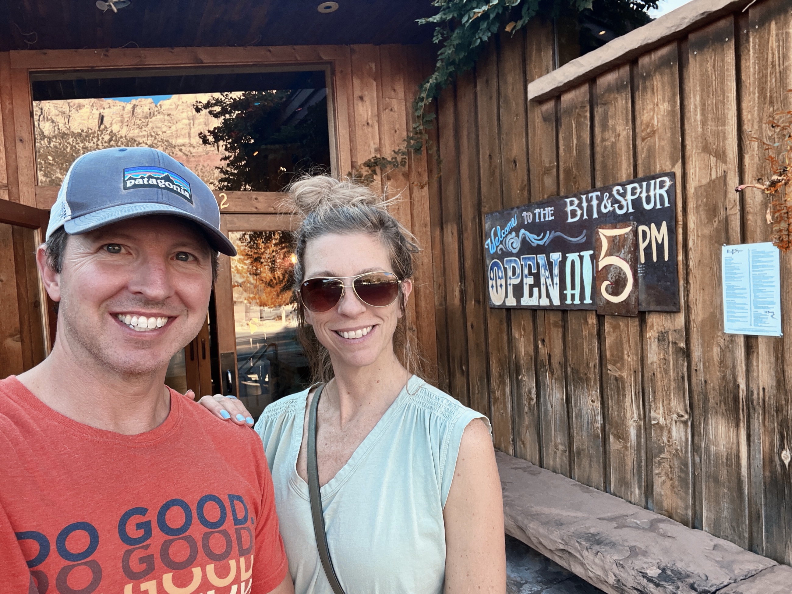 Dinner plates and drinks at Bit & Spur in Springdale, Utah after hiking in Zion National Park.