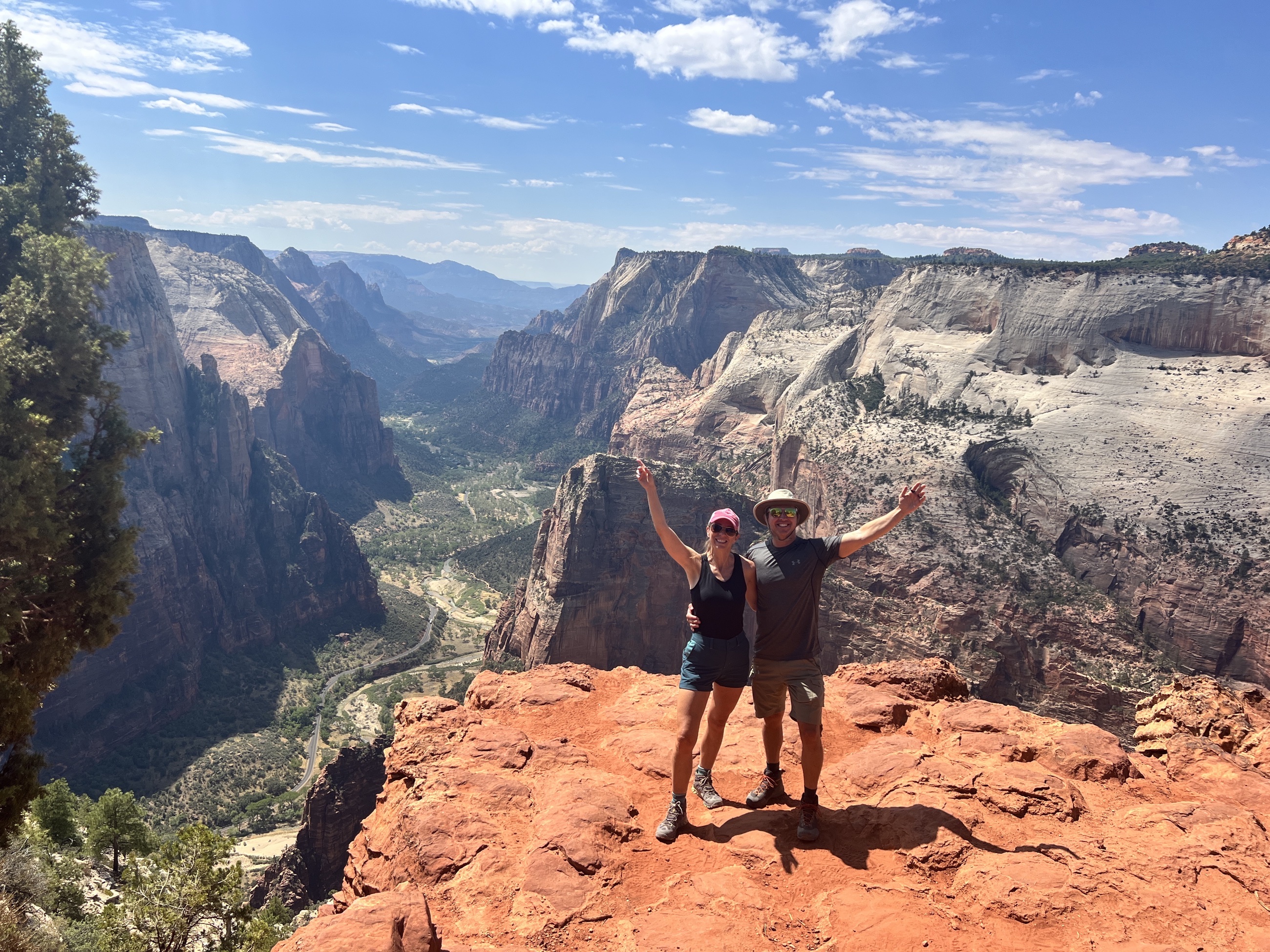 Sam and Stephanie standing at Observation Point above Zion Canyon.